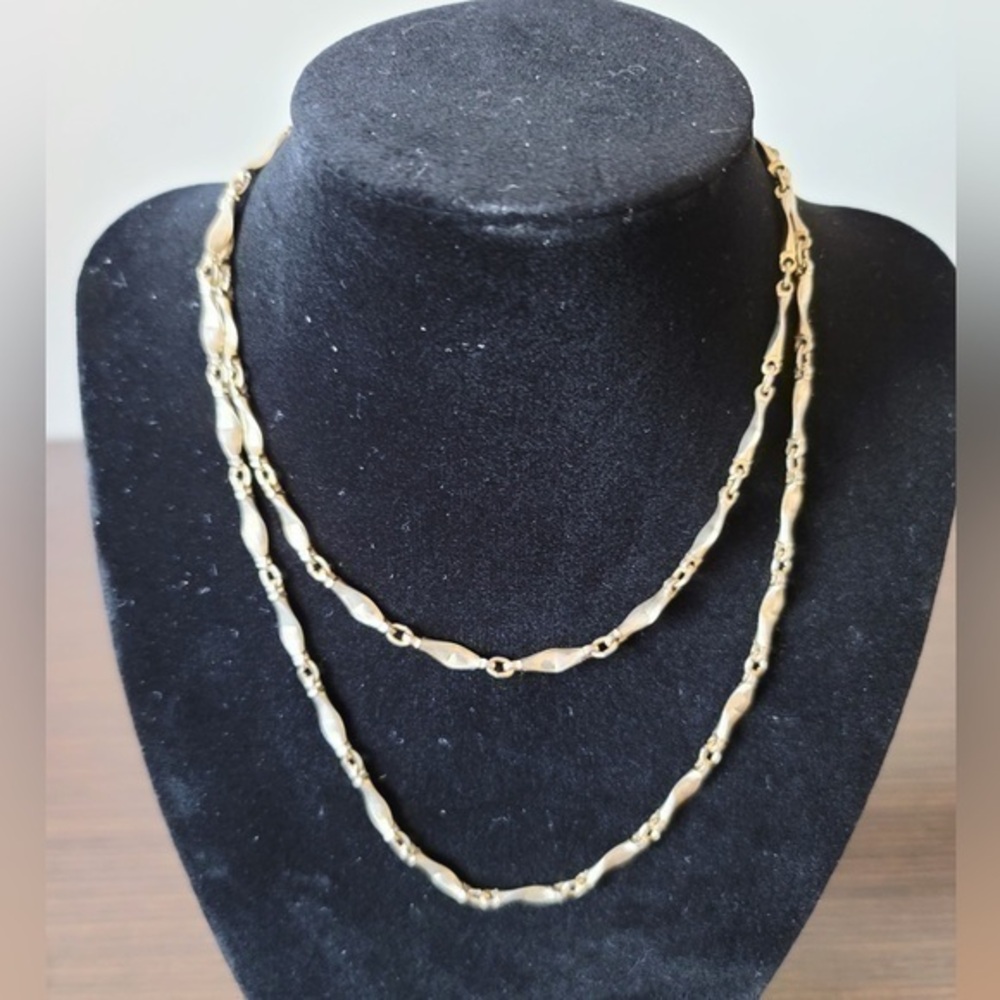 Golden necklace with interesting shape
